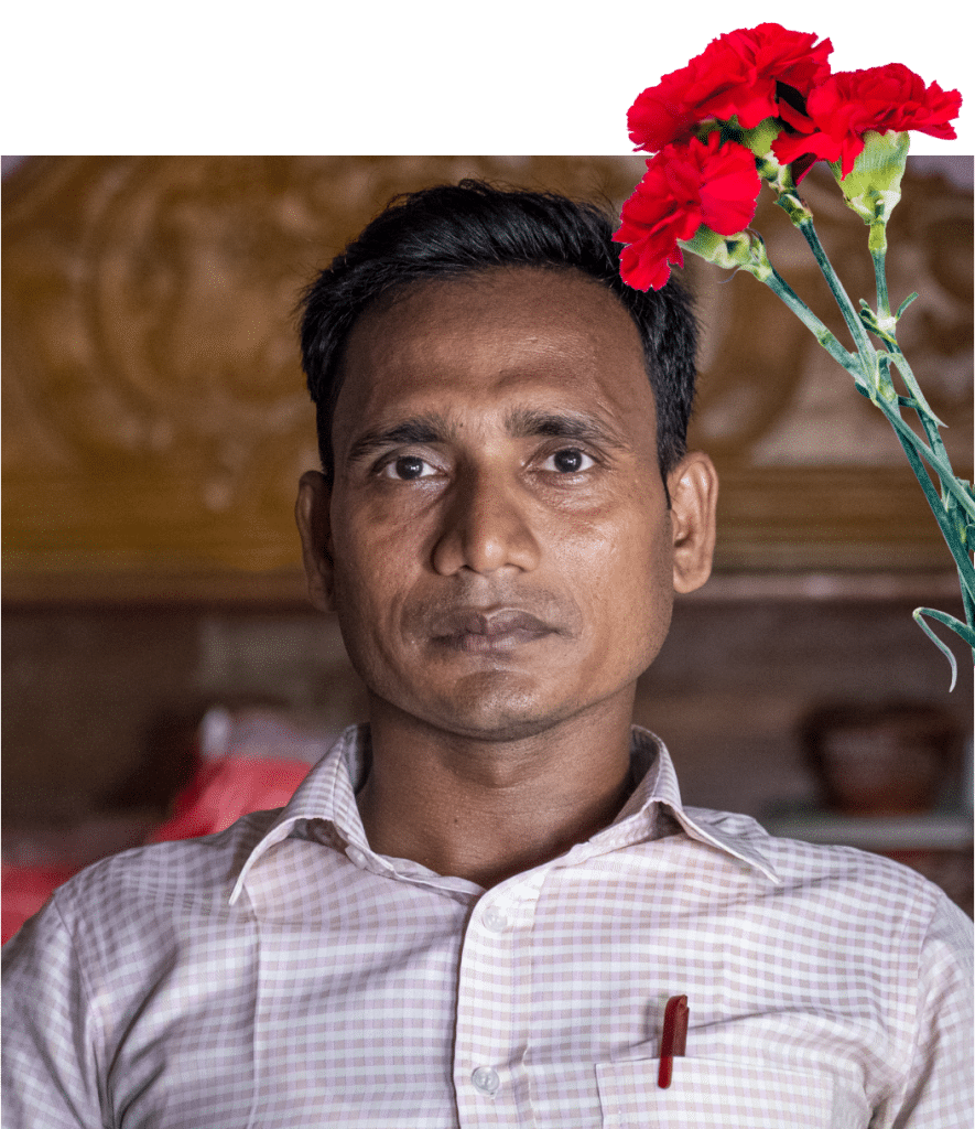 Retrato de um homem com cravos vermelhos.